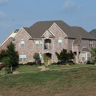Exterior of brick home in Richardson by Platinum Painting