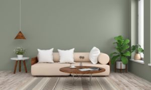 green living room showing design trends in 2022