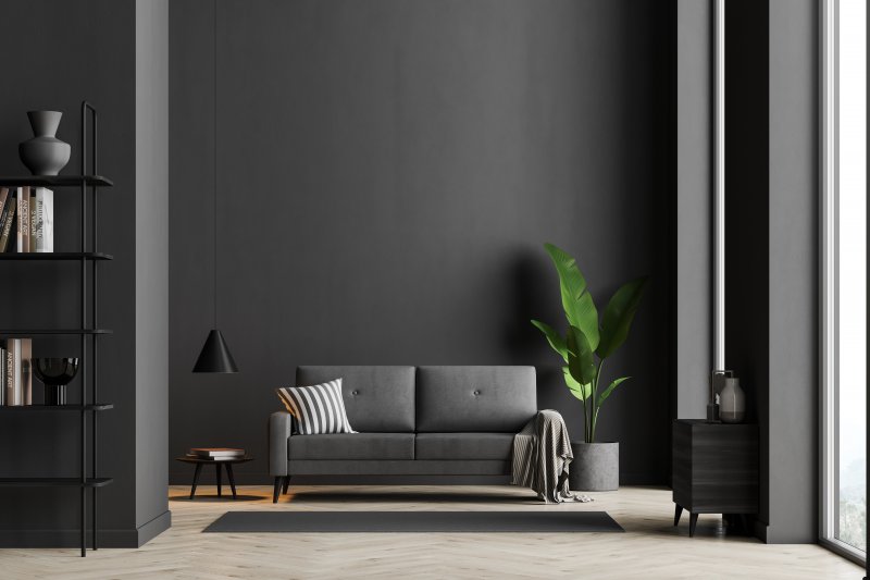 dark living room with black wall 