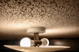 closeup of the popcorn ceiling as a home trend from the past