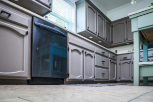 a modern kitchen with gray cabinets 